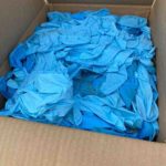 used blue nitrile gloves captured
