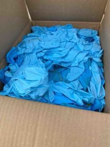 used blue nitrile gloves captured