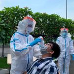 taking samples with gloves on