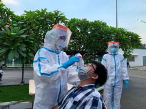 taking samples with gloves on